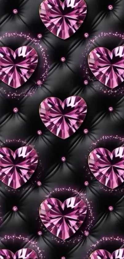 Pink gem hearts on a black tufted background.