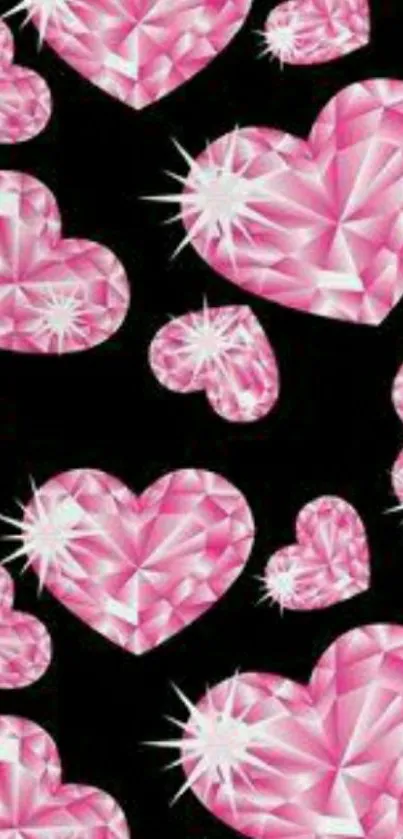 Pink gem hearts on black background wallpaper.