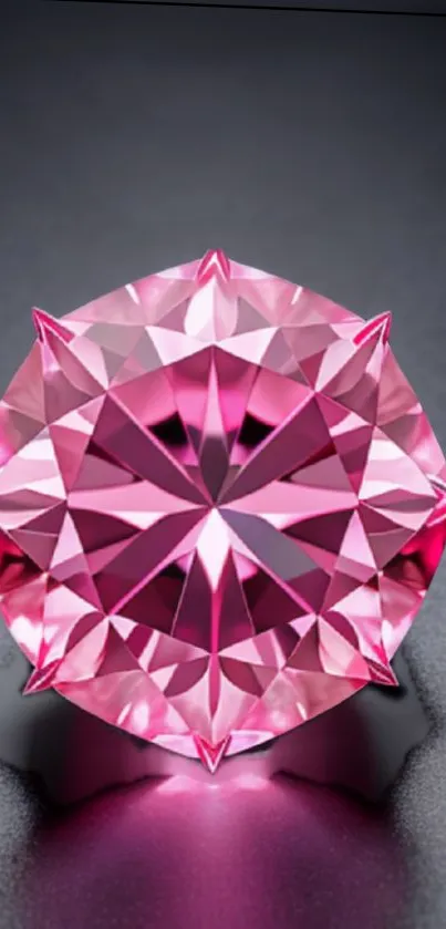 Pink gemstone shining on dark background