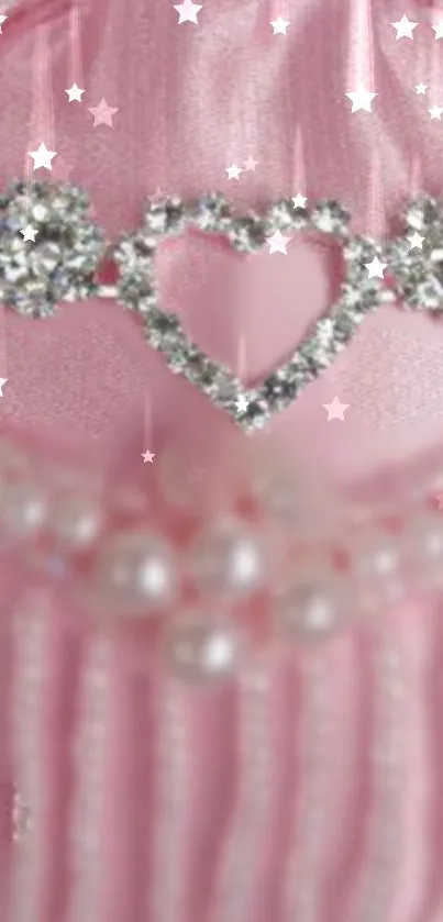 Sparkling pink wallpaper with glitter heart and pearls.