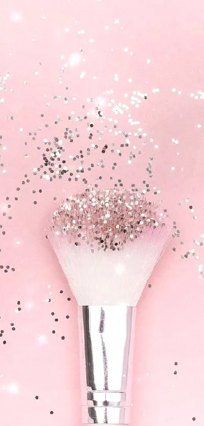 Pink background with glittery makeup brush.