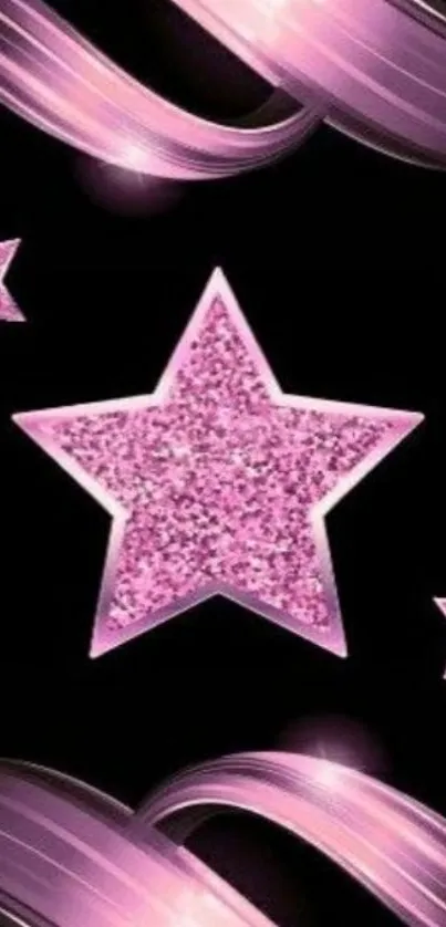 Pink glitter star design on black background.