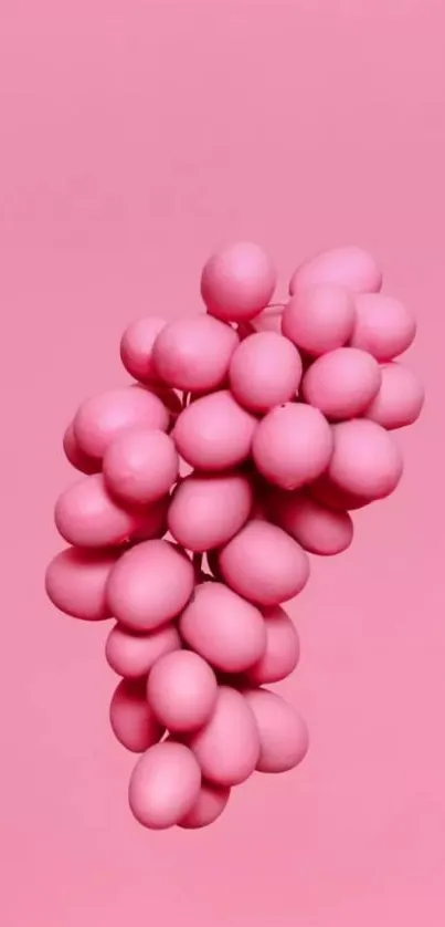 Abstract pink grapes design on mobile wallpaper.