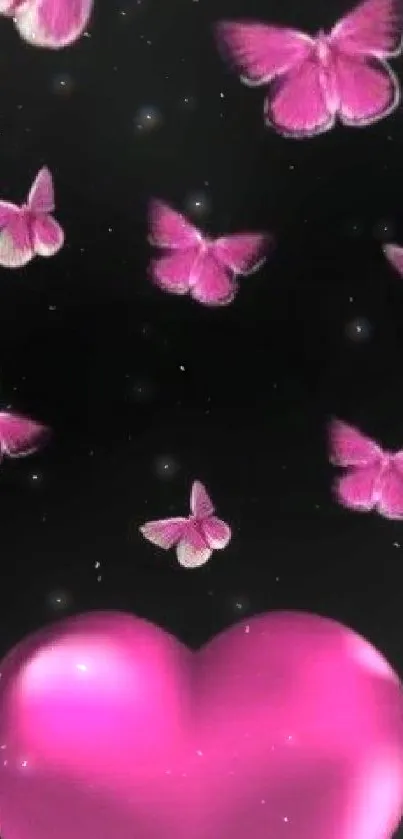 Pink heart with butterflies on black background wallpaper.