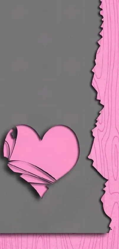 Pink heart cutout on wood texture background.