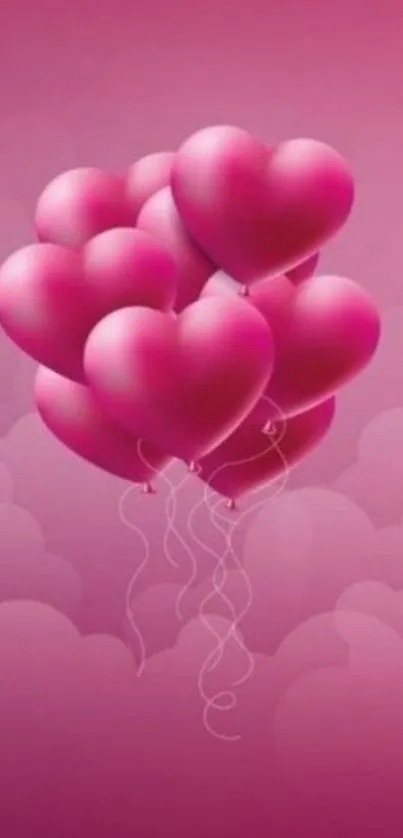 Pink heart balloons floating on pink background.