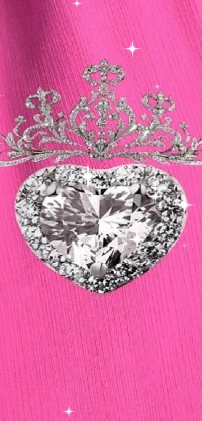 Heart-shaped diamond on pink background with crown.