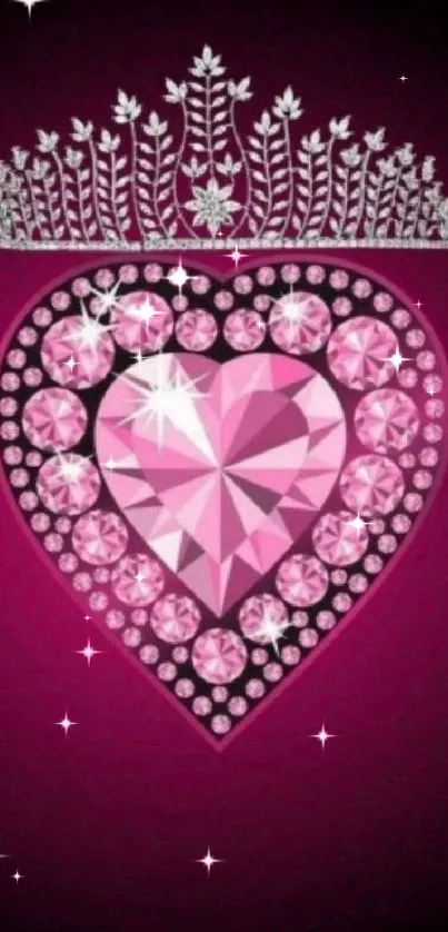 Pink heart wallpaper with gems and a crown on a dark pink background.