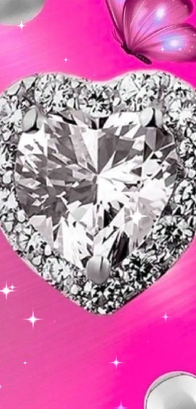 Heart-shaped gemstone with butterfly on pink background.