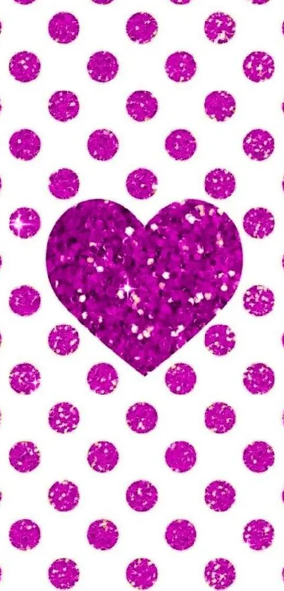 Vibrant pink glitter heart with polka dot pattern on wallpaper.