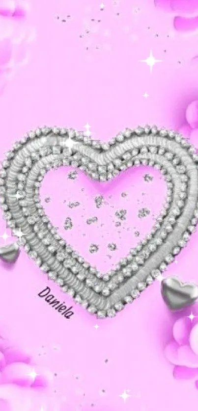 Bright pink wallpaper with glittery heart and silver accents.