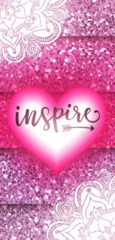 Pink heart with 'inspire' text and mandala design.