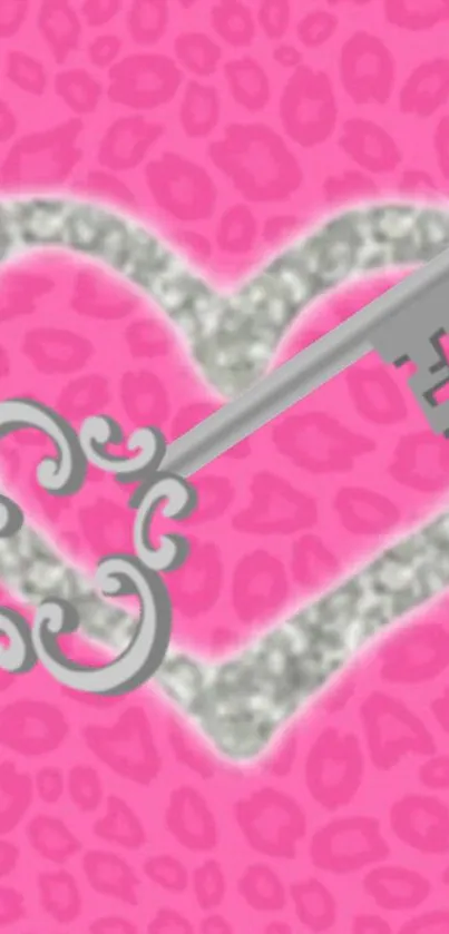 Pink leopard print wallpaper with glittery heart and silver key design.