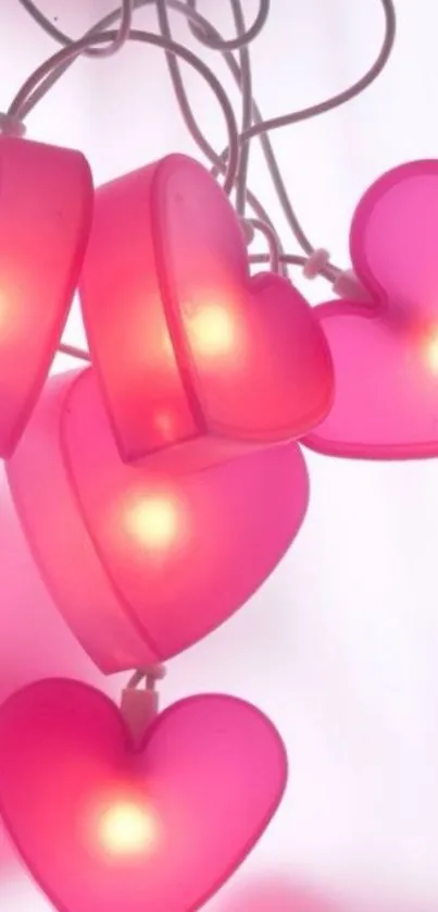 Glowing pink heart garland mobile wallpaper