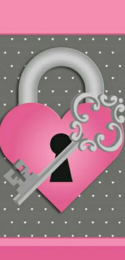 Heart-shaped lock and key on pink and gray wallpaper.