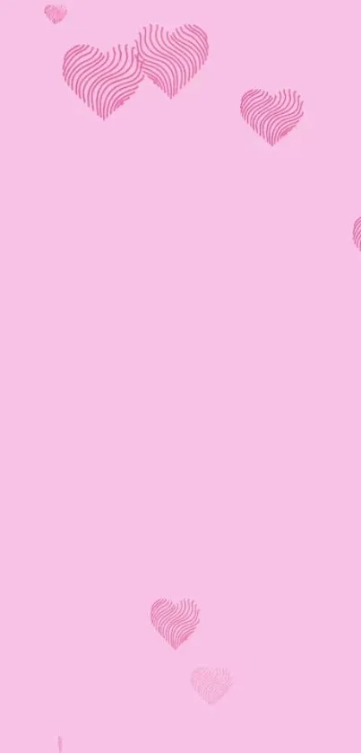 Soft pink mobile wallpaper with delicate pink heart patterns.