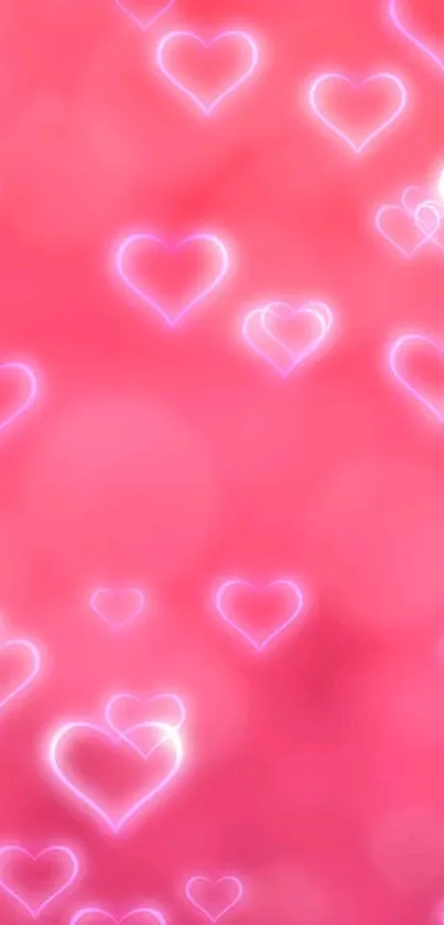 Pink neon hearts wallpaper with glowing effect.