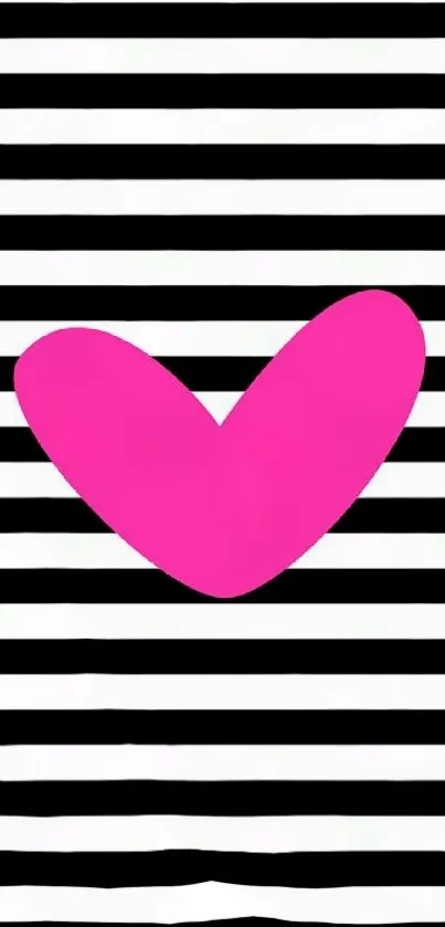 Bold pink heart on black and white striped background.