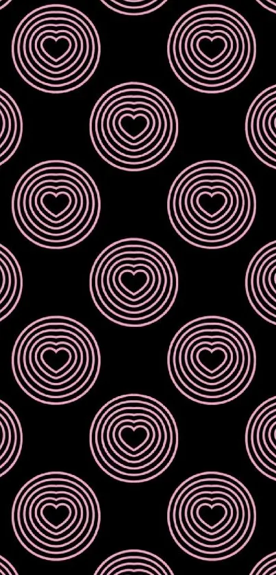 Black background with pink hearts and concentric circles wallpaper.