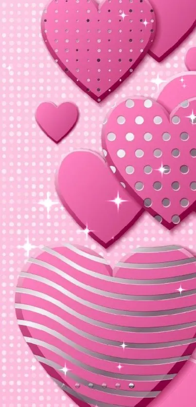 Pink heart patterned wallpaper with dots and stripes.