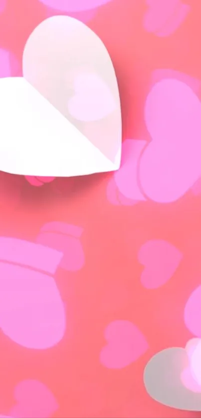 Mobile wallpaper featuring a pink heart pattern with varied pink shades.