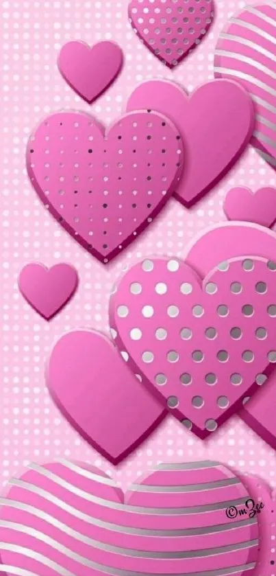 Pink hearts pattern wallpaper with polka dots and stripes.