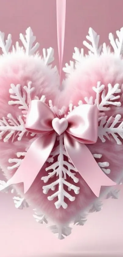 Pink heart with snowflakes and ribbon design.