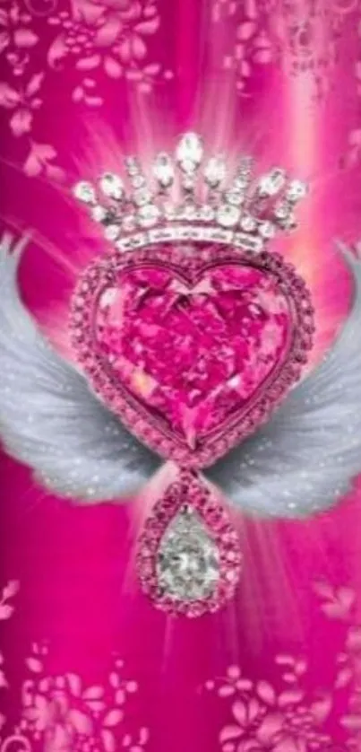 Pink heart with jeweled crown and white wings on ornate background.