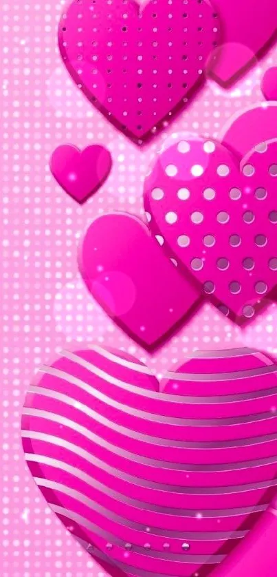 Vibrant pink hearts wallpaper for mobile featuring polka dots and stripes.