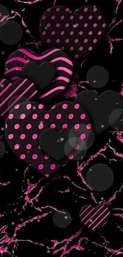 Wallpaper of pink hearts on black cracked background.