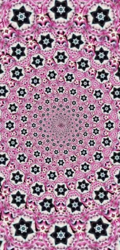 Pink kaleidoscope pattern wallpaper with intricate geometric design.