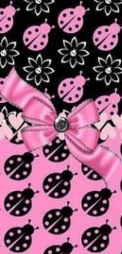 Pink and black ladybug wallpaper with a bow.