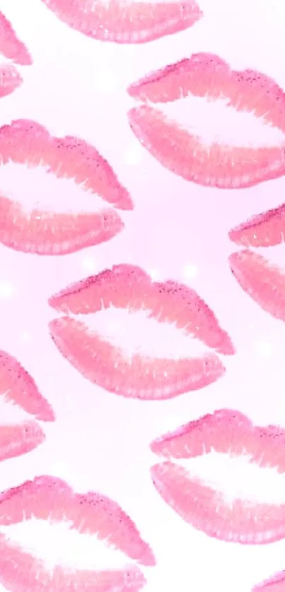 Mobile wallpaper with pink lip prints on a light pink background.