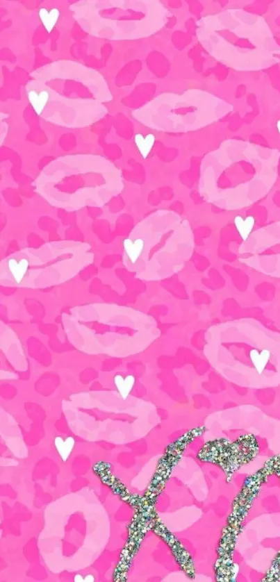 Pink wallpaper with lips, hearts, and glitter XO letters.