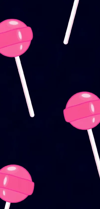 Pink lollipop pattern on dark blue background for mobile wallpaper.