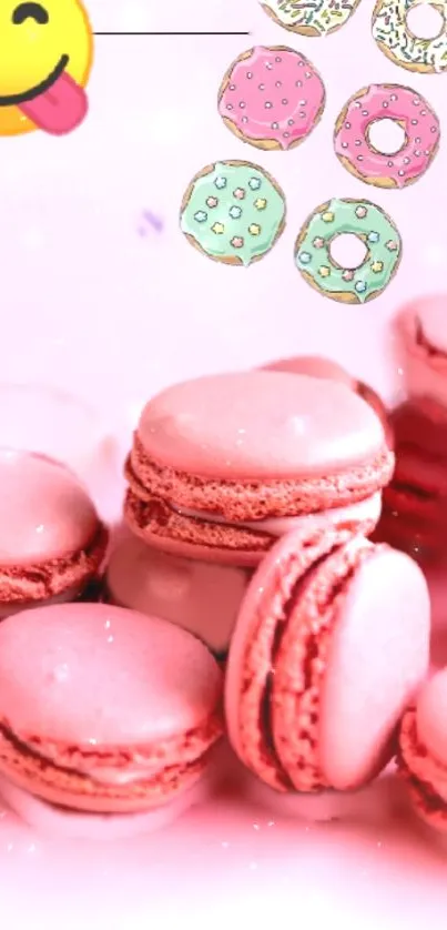 Pink macarons with cute donut illustrations.