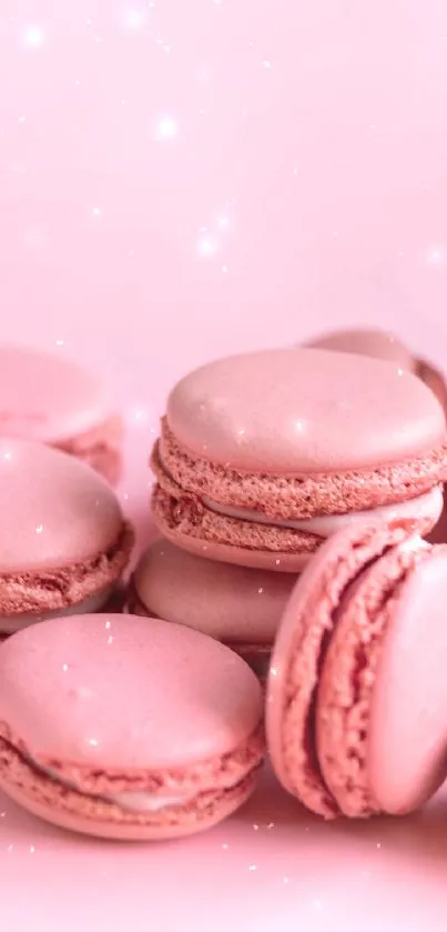 Pink macarons wallpaper with a pastel theme and sparkling effect.