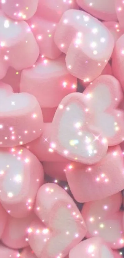 Heart-shaped pink marshmallows with sparkles.