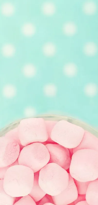 Pink marshmallows with teal polka dot background wallpaper.