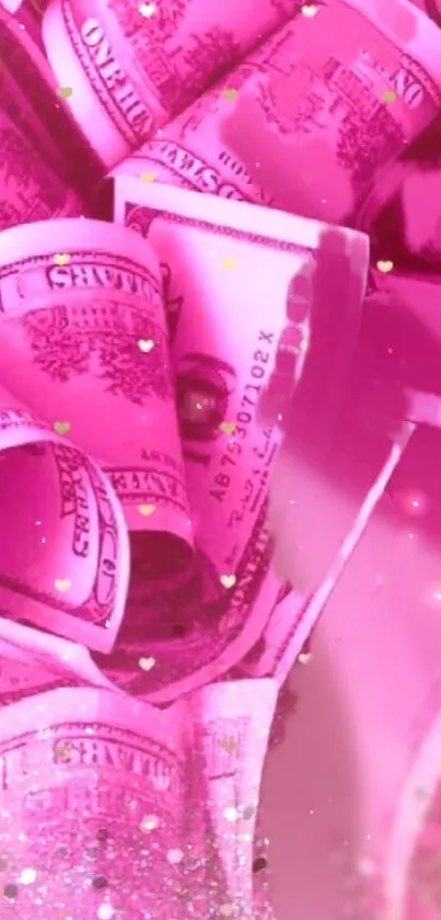 Vibrant pink wallpaper with dollar rolls and sparkles.