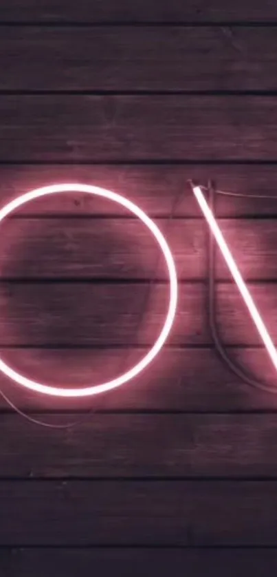 Pink neon love sign with wooden background wallpaper.