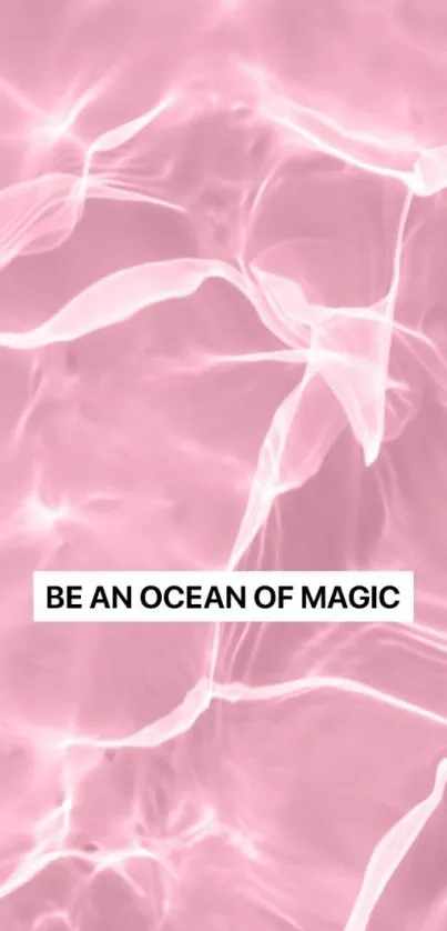 Pink ocean-themed wallpaper with inspirational text.