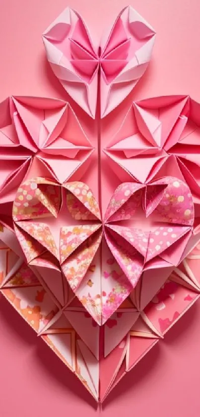 Pink origami heart wallpaper with intricate designs.