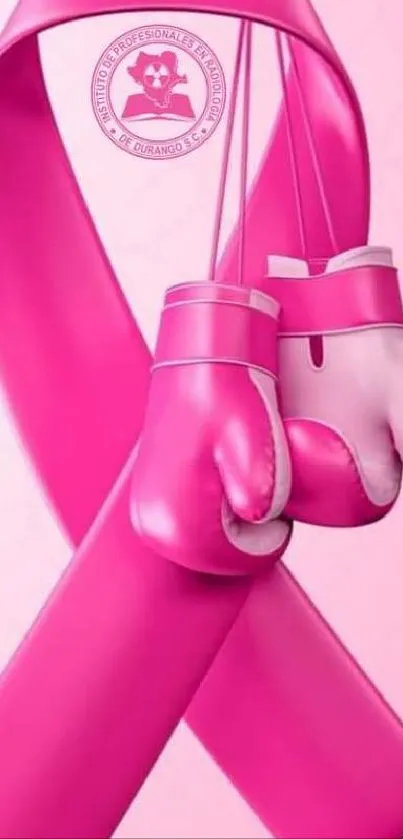 Pink ribbon with boxing gloves symbolizing strength and awareness.