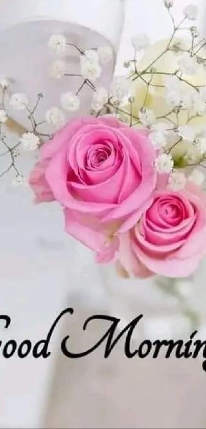 Pink roses and 'Good Morning' text on wallpaper.