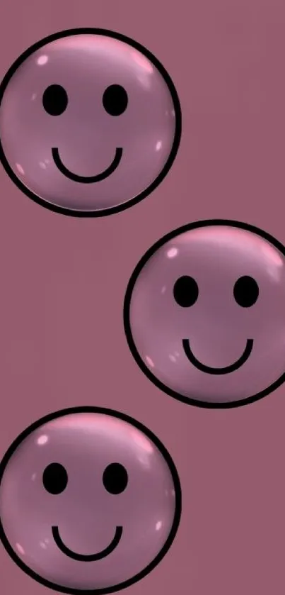 Pink smiley faces on a dusty pink wallpaper for mobile phones.