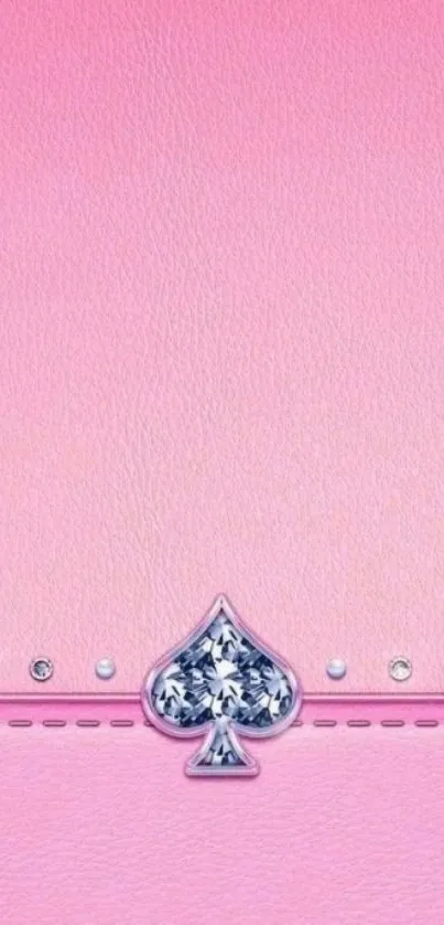 Pink spade wallpaper with rhinestone accents and leather texture.