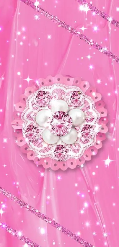 Intricate pink glitter flower design on a shiny pink backdrop.