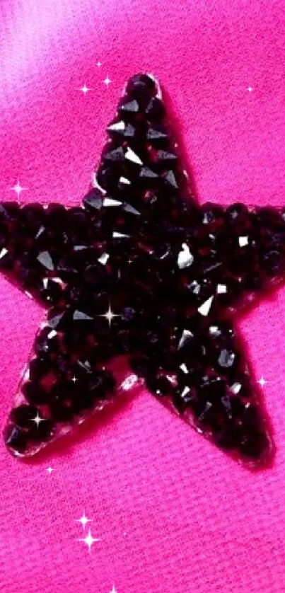 Glossy black star on bright pink fabric background wallpaper.