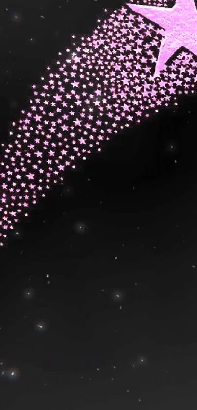 Pink shooting star on black wallpaper.